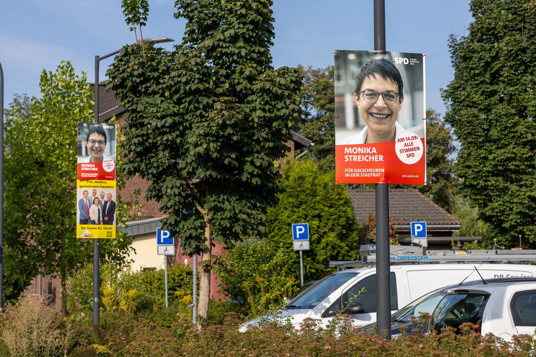 Wahlplakat im Straßenbild